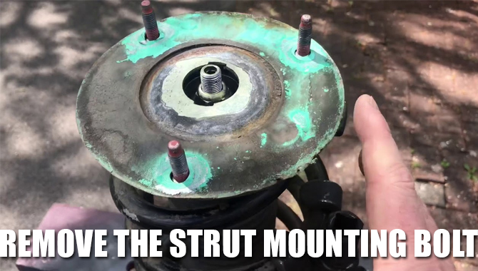 Remove The Strut Mounting Bolt