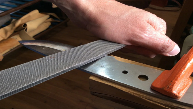 Fourth Step – Rub The Cutter Blade With The Hand File.jpeg